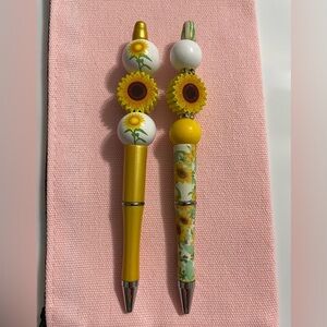 2 handcrafted sunflower pens